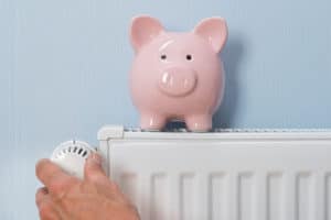 thermostat with piggy bank on radiator