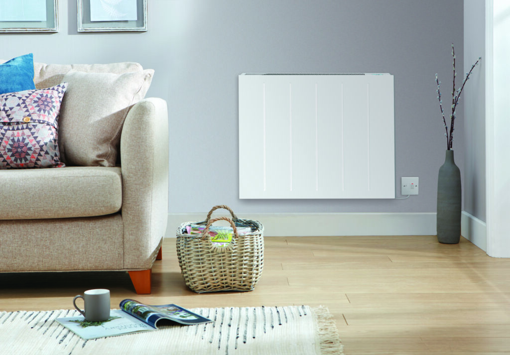 Main product image. The Electrorad Smart Panel Electric Heater in a living room with furniture and grey walls.