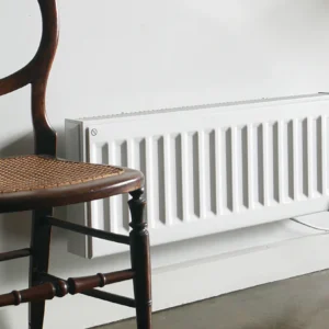 Digi-Line Electric Radiator wall-mounted in livinig space. Colour: White.