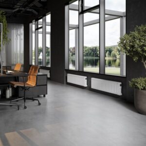 Two low-height Digi-Line Electric Radiators. In this image they arfe mounted to a wall below a low window sill.